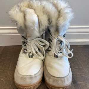 White and gray waterproof winter boots.